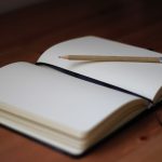 brown pencil on white book page